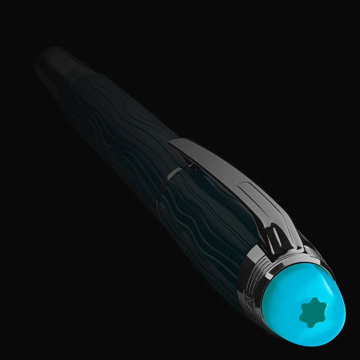 Montblanc StarWalker Polar Green fountain pen with the top in the dark so it lights up